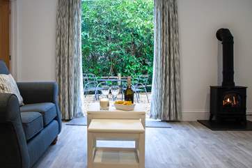 Open the double doors to the secluded private courtyard.