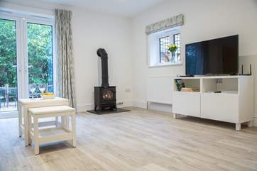 Instant heat from the gas-fired wood-burner effect stove, perfect for those out-of-season breaks.