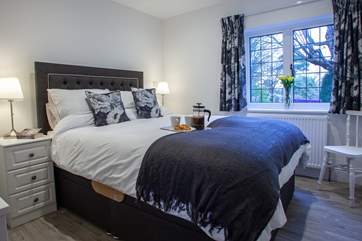The bedroom has a comfy king-size double bed.