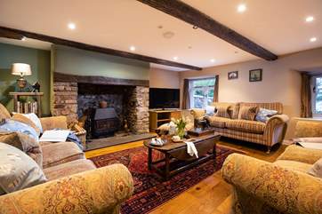 Relax on the sofas watching a movie or chatting over the day's adventures.