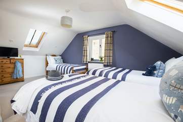 Bedroom 5 can be set up as three single beds or a super-king double bed plus the single bed in the corner.