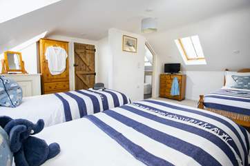 This first floor bedroom also has an en suite shower-room.