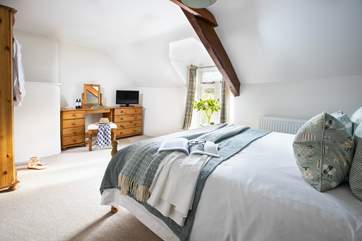 Bedroom 4 has a comfy king-size double bed and its own en suite bathroom.