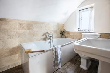 Take a long soak in one of two farmhouse bathrooms.