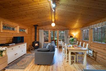 Lovely open plan living space with wood-burner.