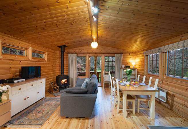 Lovely open plan living space with wood-burner.