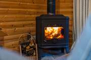 Cosy up together around the roaring wood-burner.