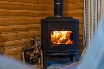 Cosy up together around the roaring wood-burner.