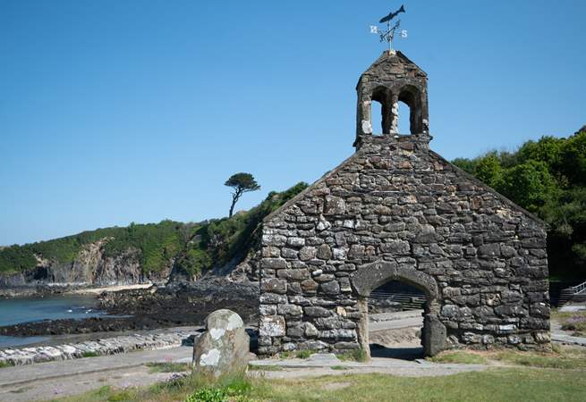 The west end of 12th century St. Brynach's church sits on the beach front. The rest of the church was destroyed in the Great Storm of 1859. 