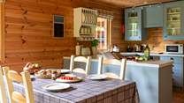 Take a seat at the dining table and enjoy sharing special stories from the day's adventures. 