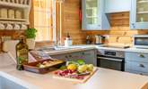 The modern-style kitchen has everything you need for your stay in nature.  - Thumbnail Image