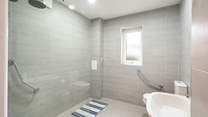 Spacious wet-room on the ground floor.