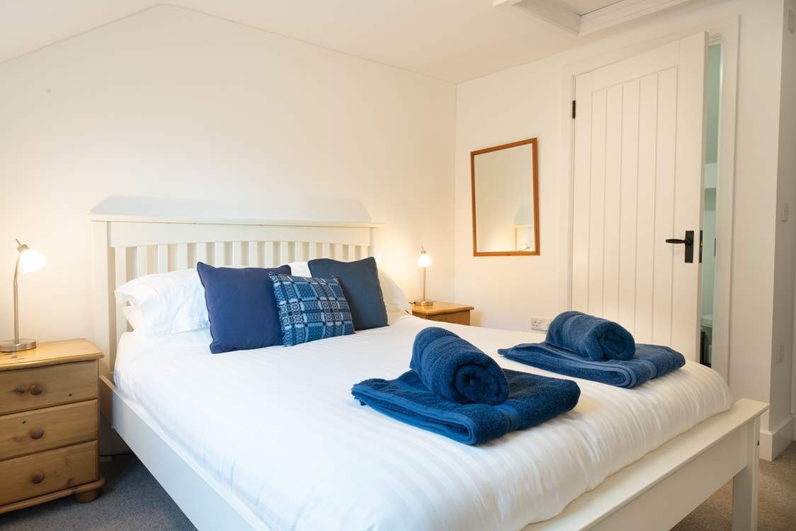 Bedroom 1, double room with king-size bed.