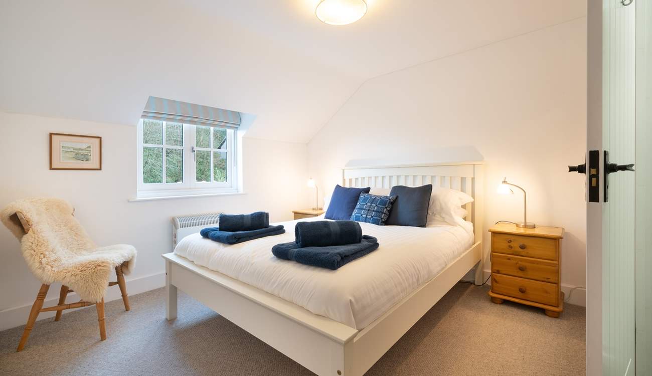 Bedroom 1, a tasteful double room with king-size bed.