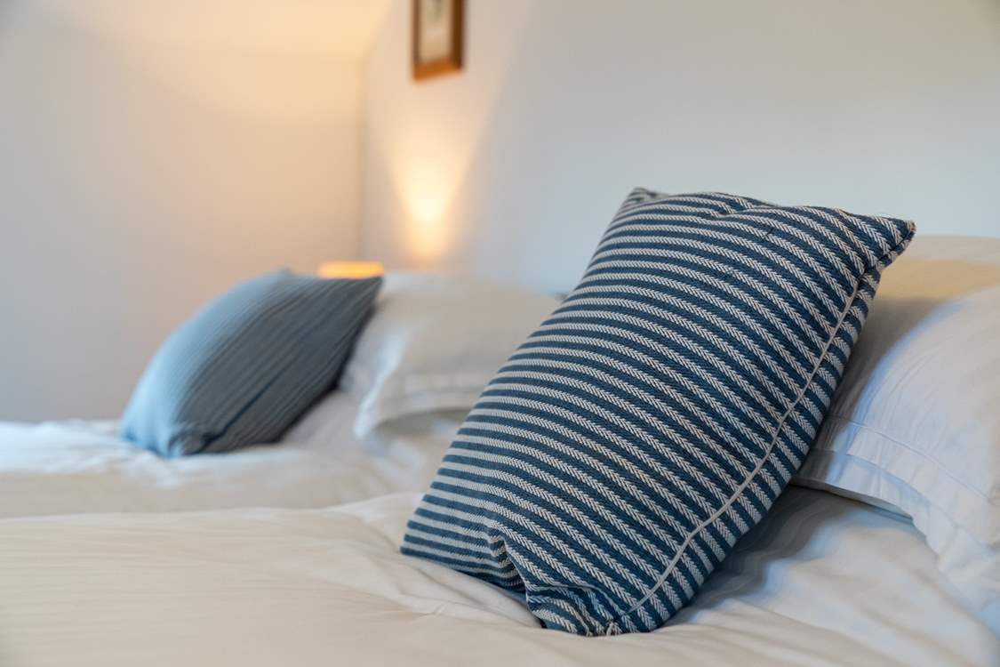 Twin room bathed in sunshine.