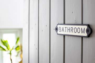 Open the door to the wonderful bathroom.