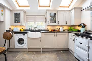 The kitchen overlooks the private outdoor space.