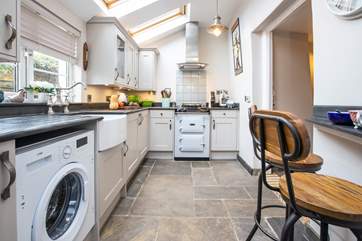 The Velux windows make the kitchen a lovely open and light space for meal preparation.