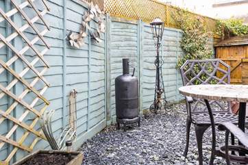 Sit and enjoy the private outside space.