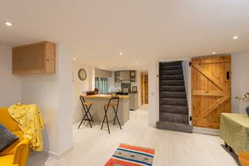 A fabulous open plan space. The shower-room is situated at the far end, beyond the kitchen.
