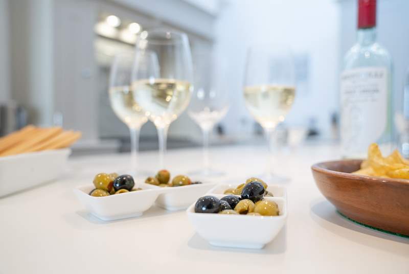 Nibbles and wine, surrounded by good company from your friends and family.