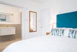 The stunning main bedroom on the first floor with an en suite shower-room.