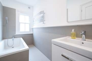 The modern family bathroom on the first floor.