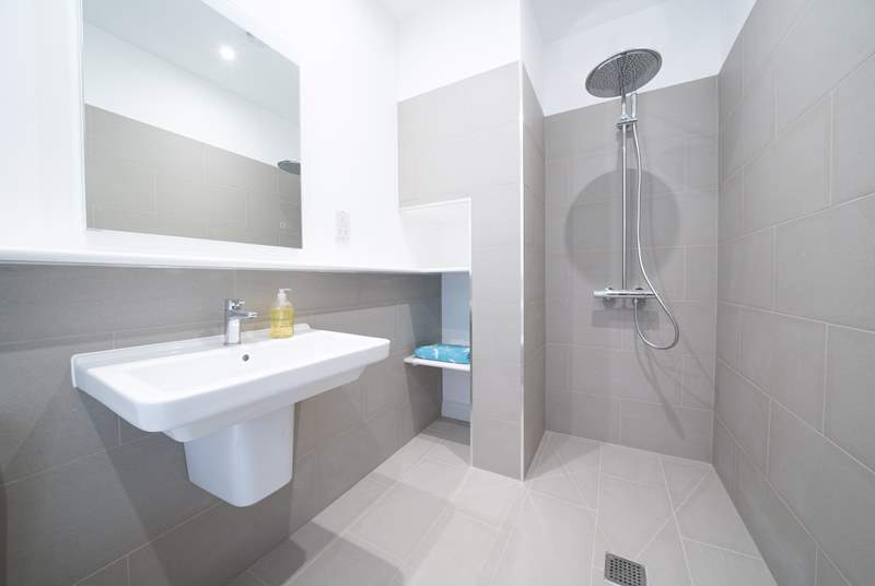 The sleek ground floor wet-room, ideal to wash off the sand after a day spent at the beach!