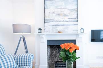 The second sitting-room offers a second television and a gas fire.