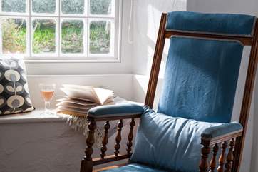 Sit a while and read your book with views out onto the garden.