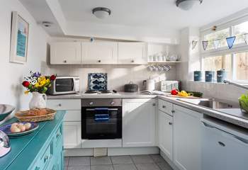 The kitchen is light, airy and very well-equipped. 