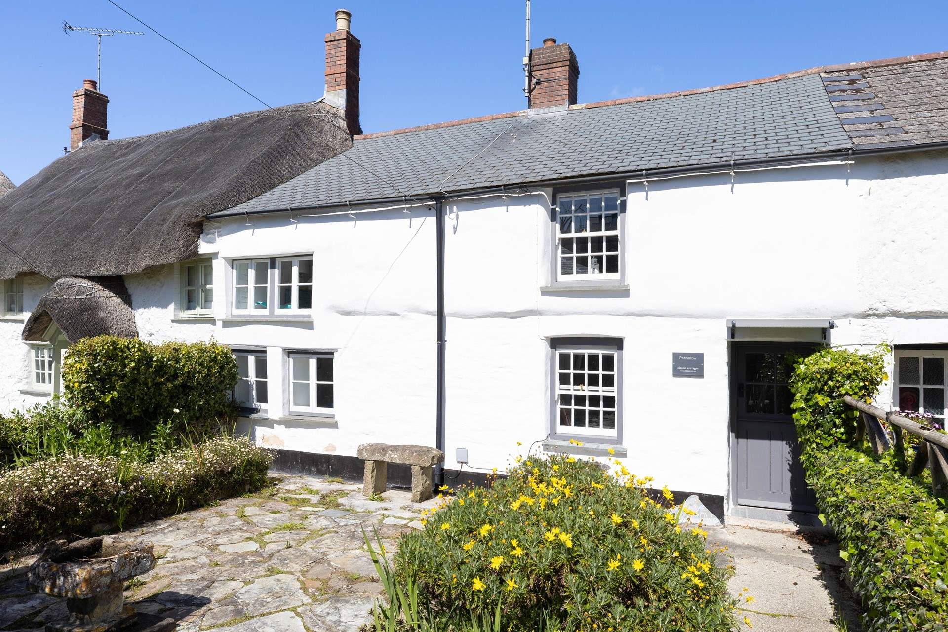 Enjoy a cup of tea and watch the world go by on their way to the beach. 