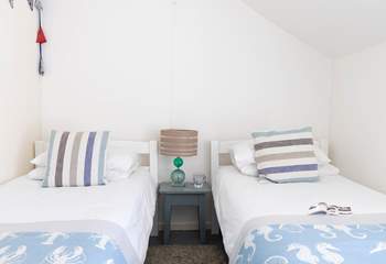 The second bedroom has twin beds perfect for children or friends. 