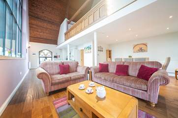 The open plan living-room with kitchen and dining areas will be a popular space for all the family to enjoy.