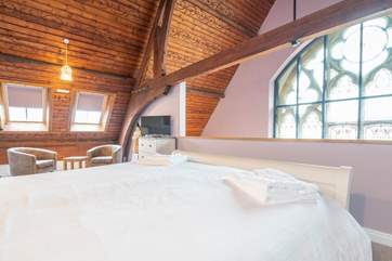 The main bedroom has a seating area, start your day with a nice quiet cup of coffee.