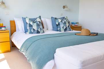 Bedroom 2 is beautifully decorated in pastel shades and has an en suite shower-room.