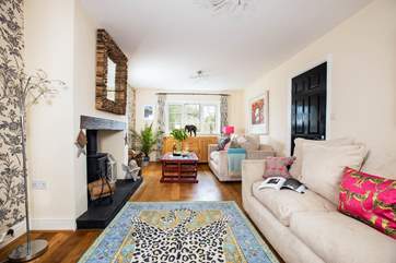 The main sitting-room benefits from that all-important log-burner for those cooler nights.