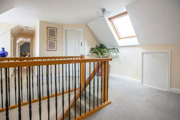 The top landing sits between bedroom 3 and bedroom 4 both being en suite. The first floor is situated in the eaves of the house, so the rooms have sloping ceilings.