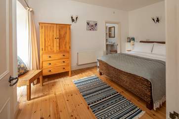 Bedroom 1 is situated on the lower ground floor. Offering a king-size bed to slip into at the end of the day.