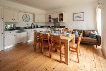 The kitchen is a great place to dine and feast together.
