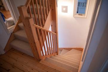 The staircase links all three floors beautifully.