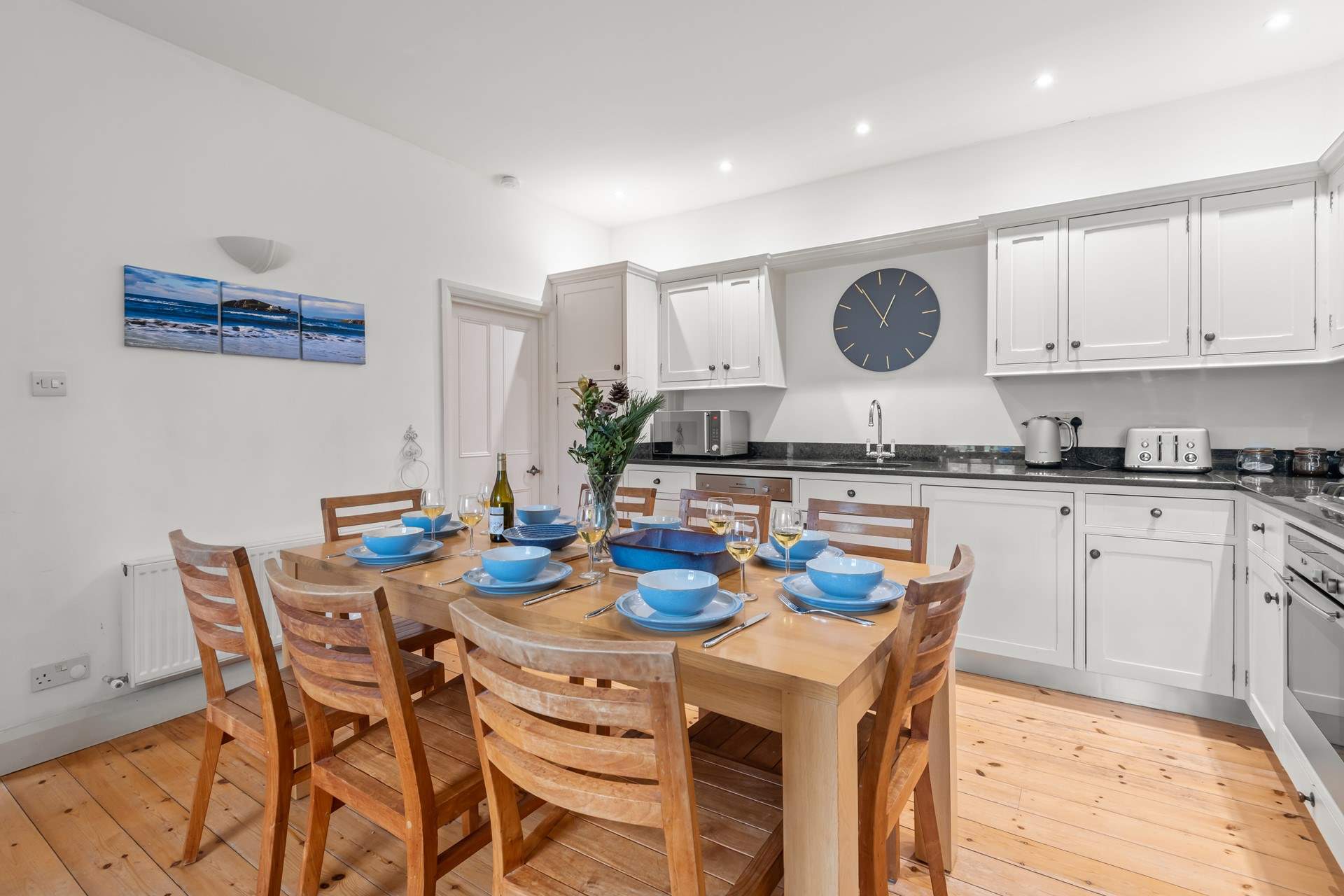 The beautiful kitchen is a sociable place to gather whilst supper bubbles away.