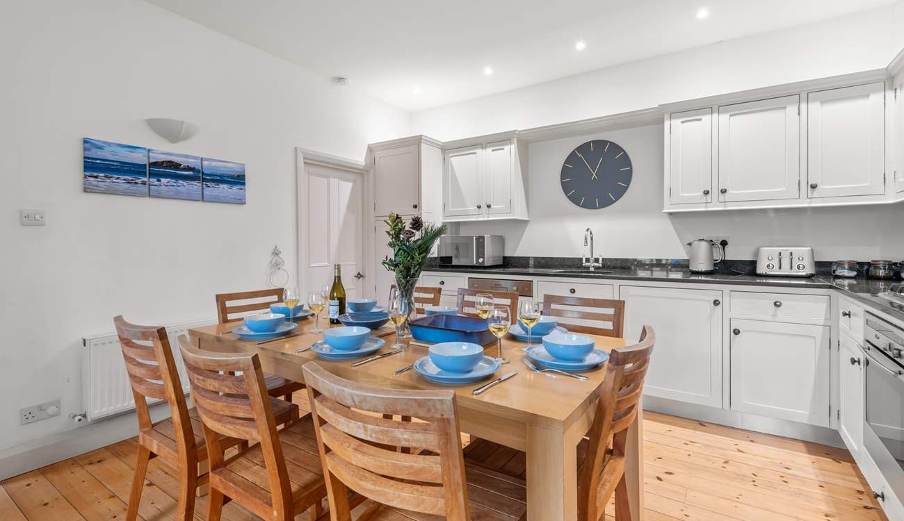 The beautiful kitchen is a sociable place to gather whilst supper bubbles away.