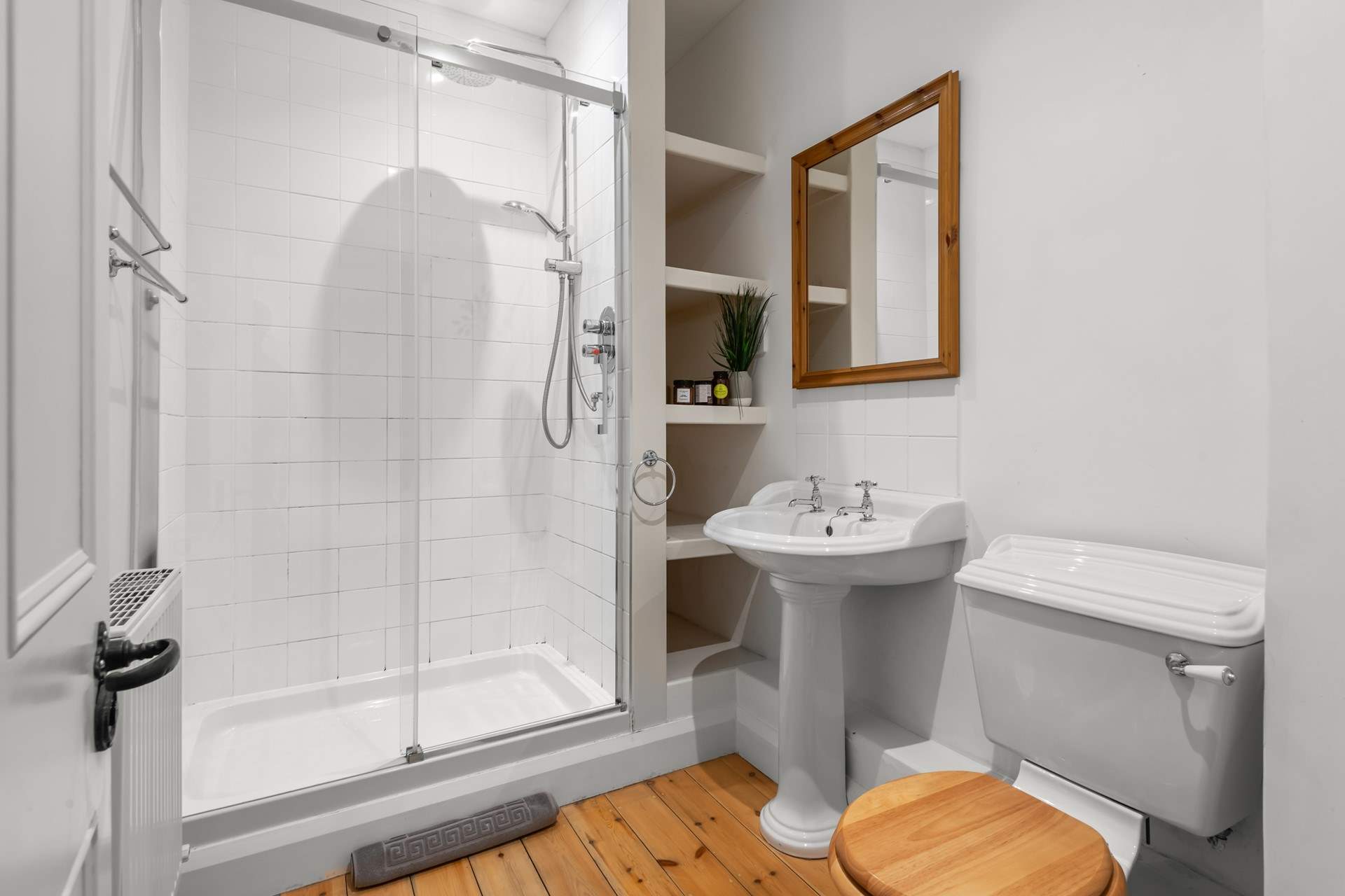 Bedroom 1's en suite shower-room.