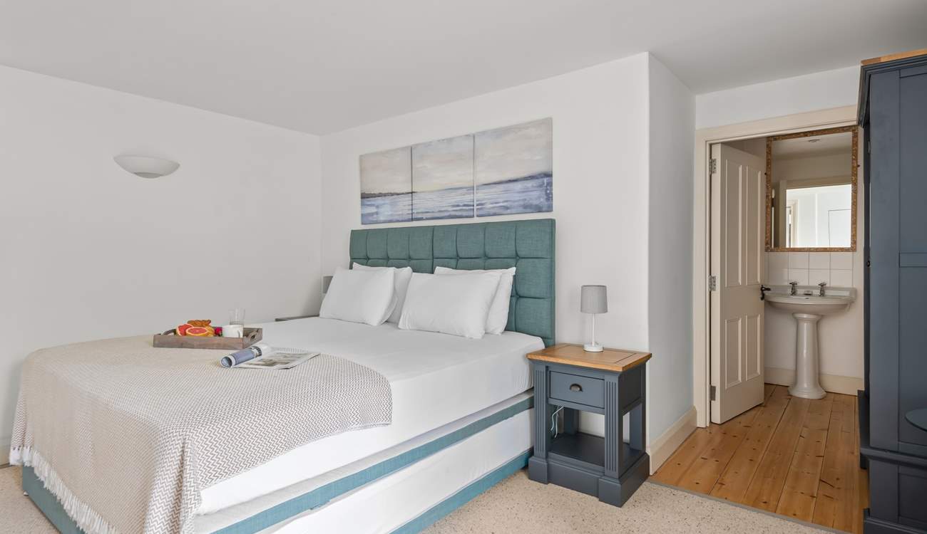 Bedroom 2 has an en suite WC and wash-basin.