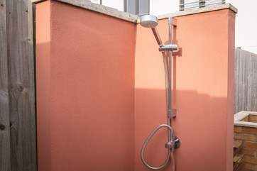 There is a very useful outside shower which is perfect for washing away the sand.