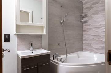 The lovely family bathroom is located on the first floor, and shared between bedrooms 1 and 2.