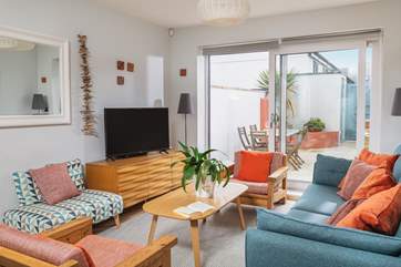The open plan living-room is bright and light.