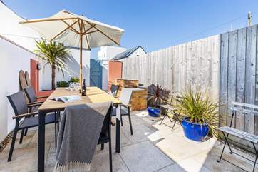 The patio area is the perfect spot for an informal dinner.