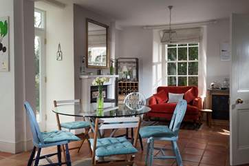 The lovely kitchen for all your culinary needs has a casual breakfast table for more informal dining.